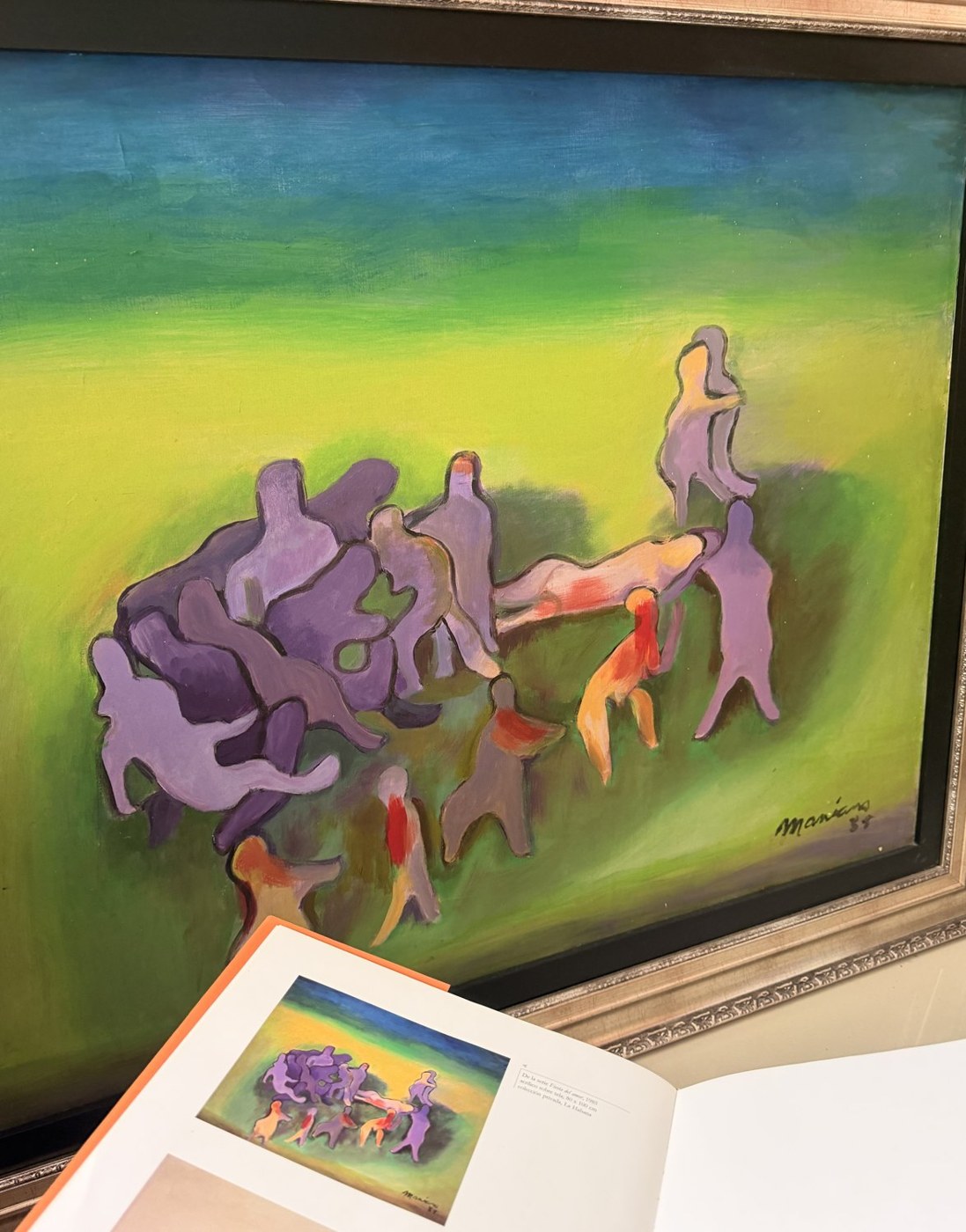 La pintura junto a la lámina publicada, en su marco actual